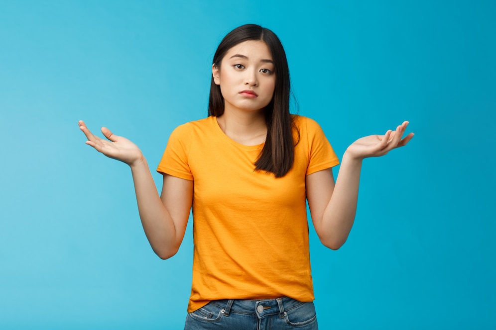shit-happens-indifferent-absolutely-careless-female-student-care-how-accident-happened-shrugging-look-camera-questioned-unaware-hard-answer-clueless-how-deal-situation-stand-blue-background_1258-57764